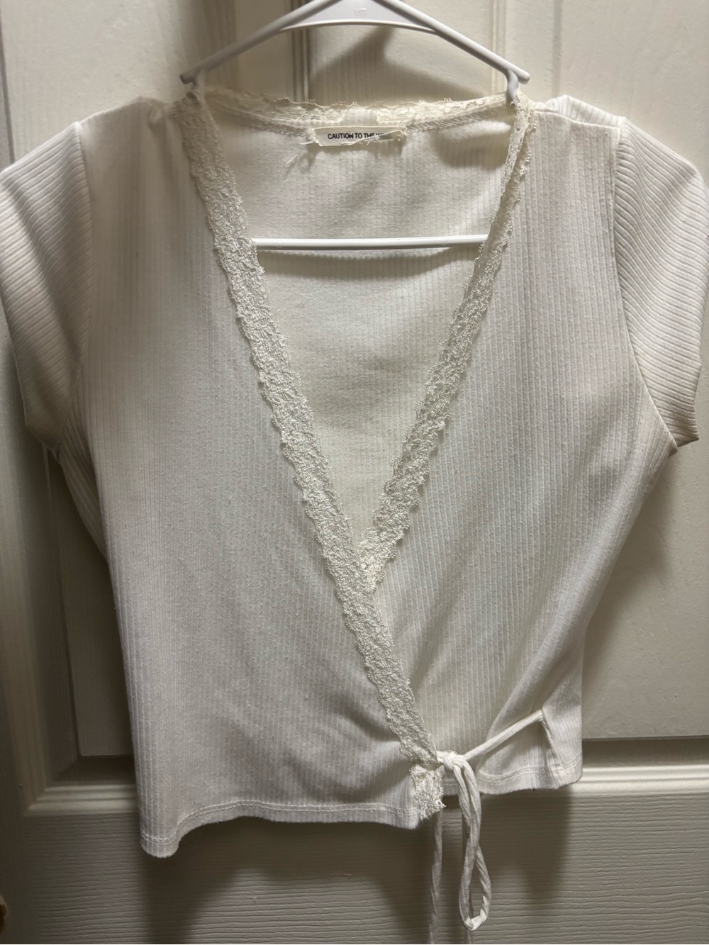 Caution To The Wind Cream Lace-Trim Ribbed Wrap Crop Top